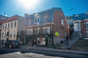 Historic stone homes in Old Quebec, showcasing 1830s architecture and charming cobblestone streets.