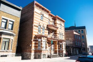 Historic stone homes in Old Quebec showcasing 19th-century architecture along charming cobblestone streets.